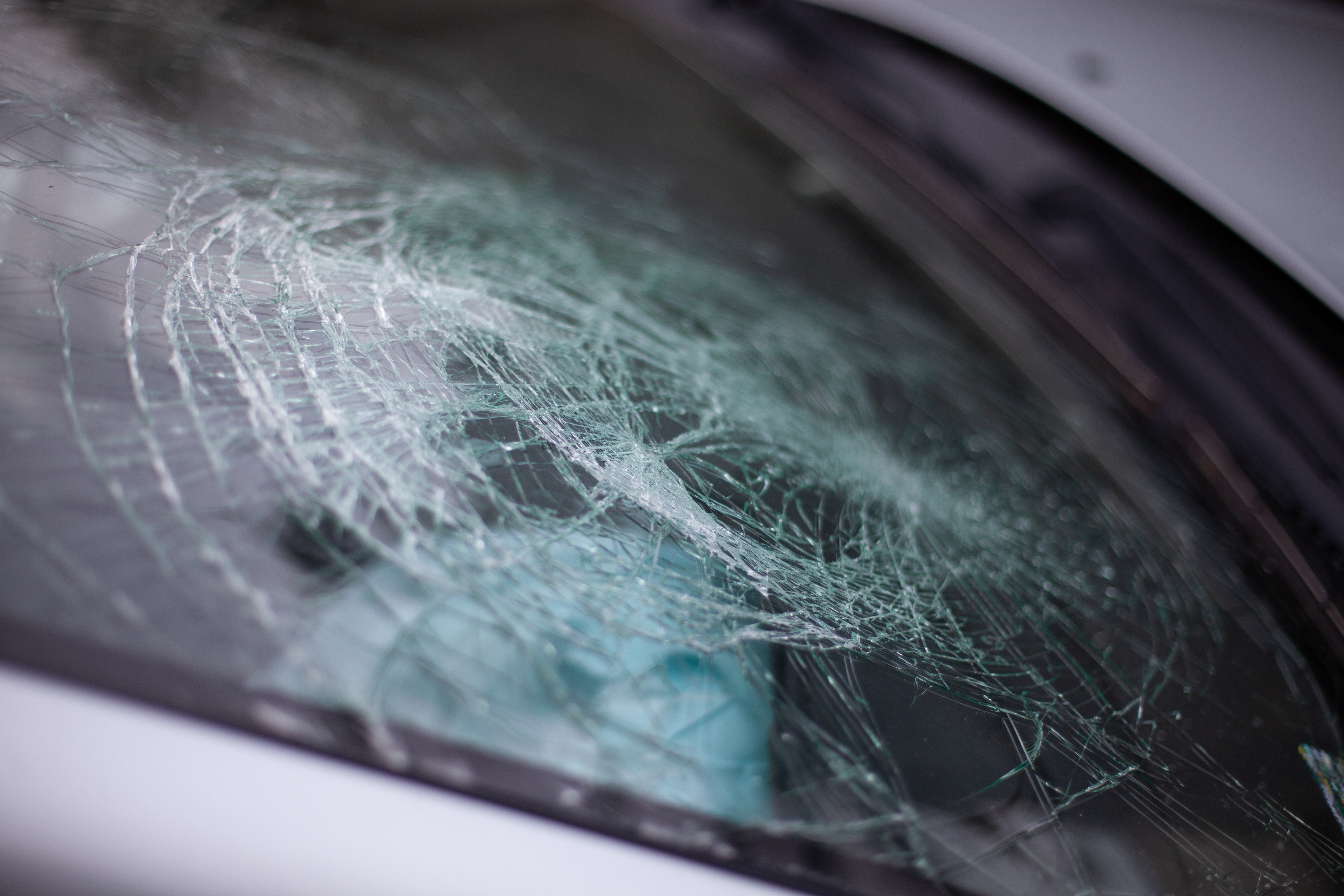 Broken car windshield after an accident